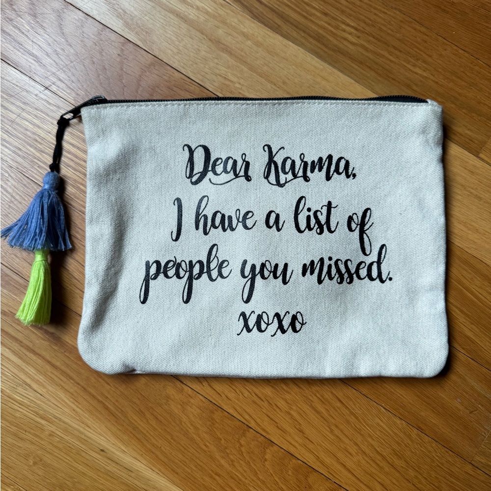 Zippered pouch with green and blue tassle